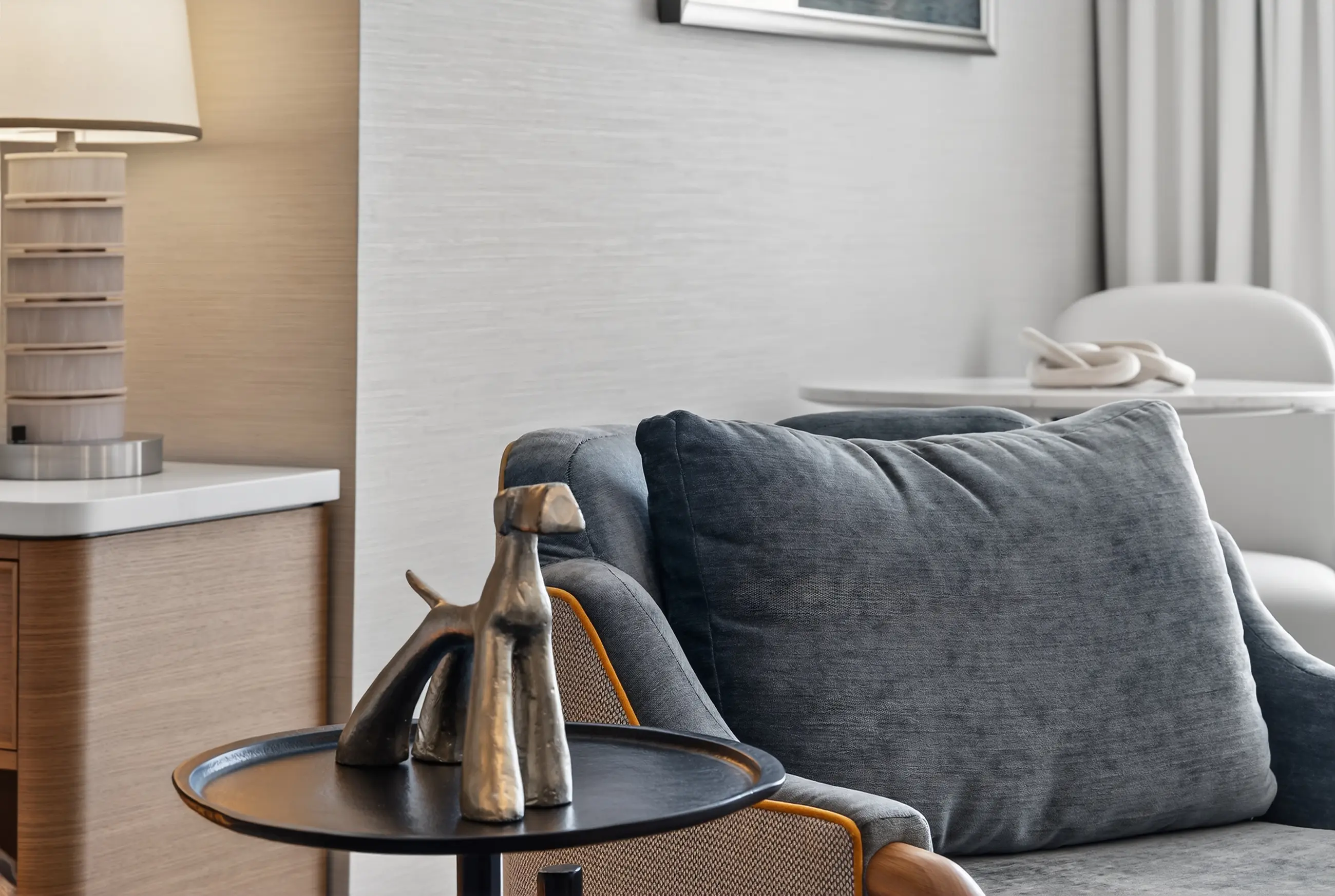 Hotel room bed and pillows.