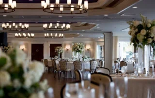 Jessica & Kevin's wedding reception tables & floral arrangements.