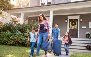A family of four walk down their walkway, heading to Saybrook Point for their Connecticut staycation.