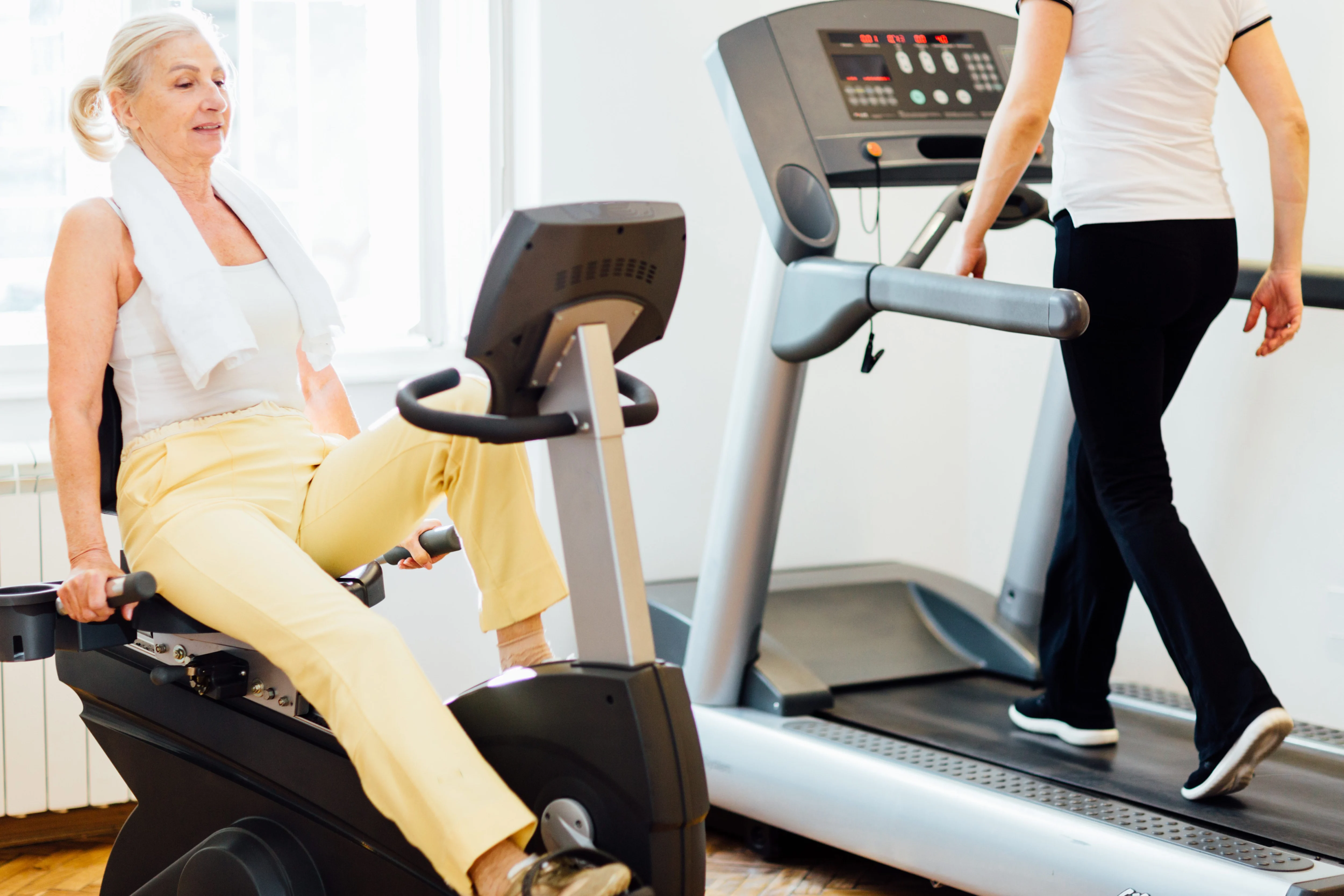 Older woman training at the gym